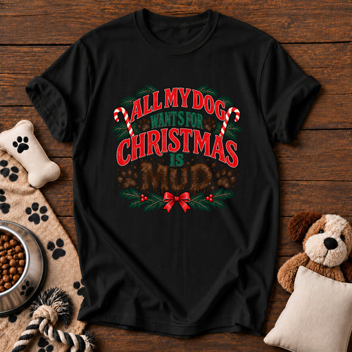 All My Dog Wants for Christmas Is Mud Tee — funny dog t-shirt in Black, Comfort Colors 1717 flat lay