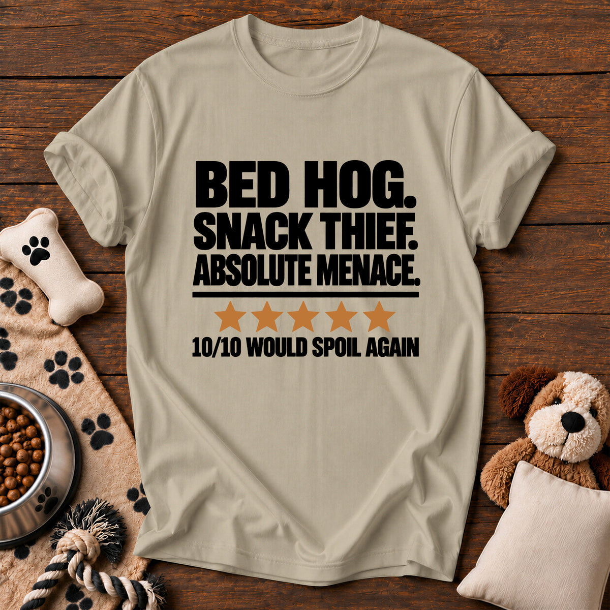 Bed Hog Snack Thief Dog Tee — funny dog t-shirt in Sandstone, Comfort Colors 1717 flat lay