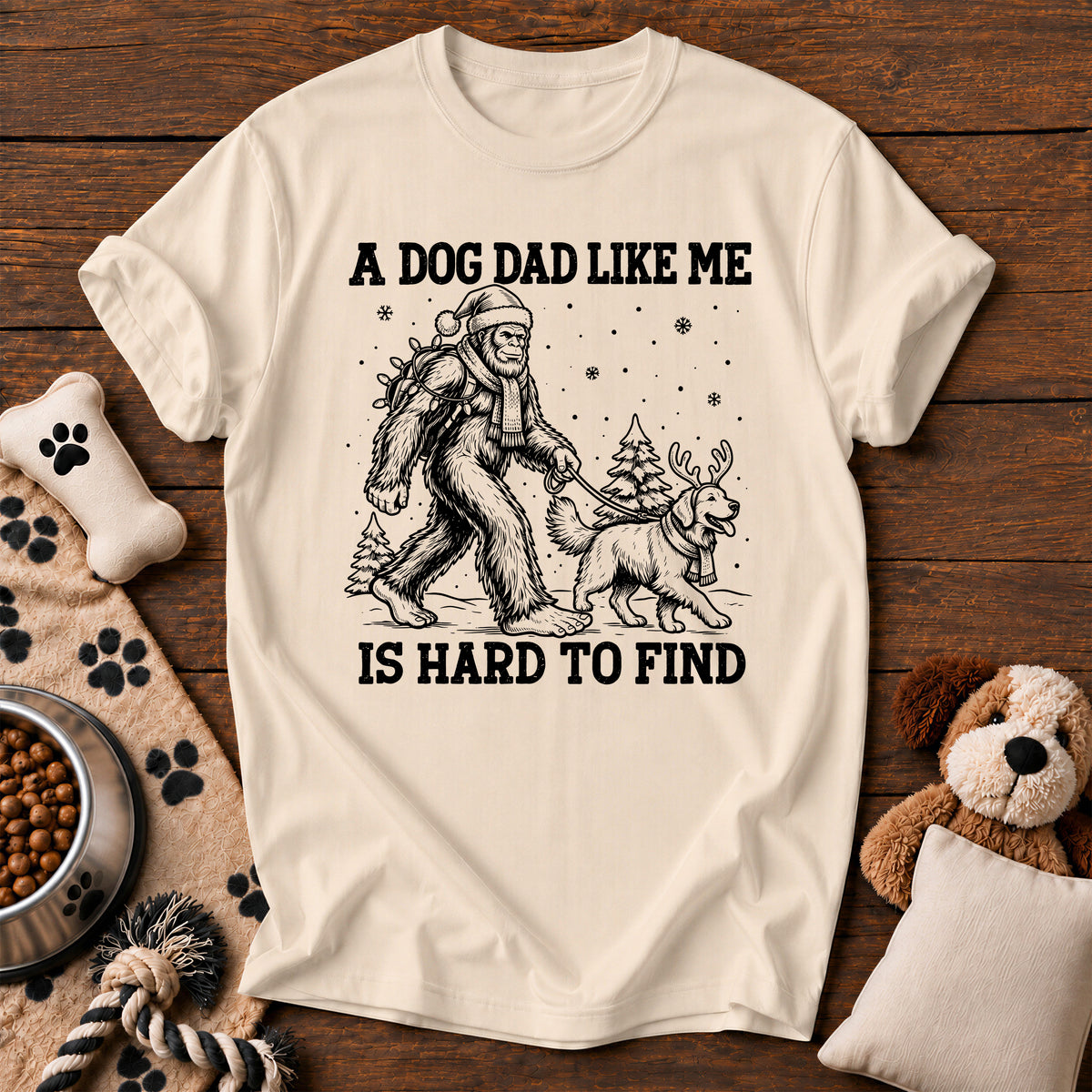 Bigfoot Dog Dad Christmas Tee — funny dog t-shirt in Ivory, Comfort Colors 1717 flat lay