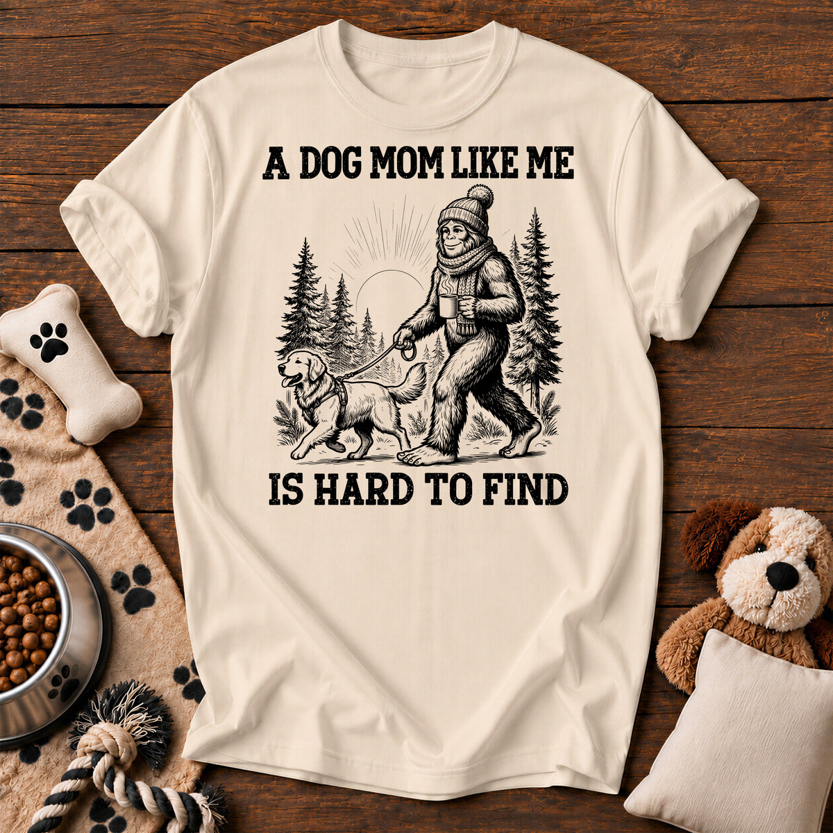Bigfoot Dog Mom Tee — funny dog t-shirt in Ivory, Comfort Colors 1717 flat lay