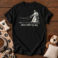 Jesus Walks My Dog Tee — funny Christian dog t-shirt in Black, Comfort Colors 1717 flat lay