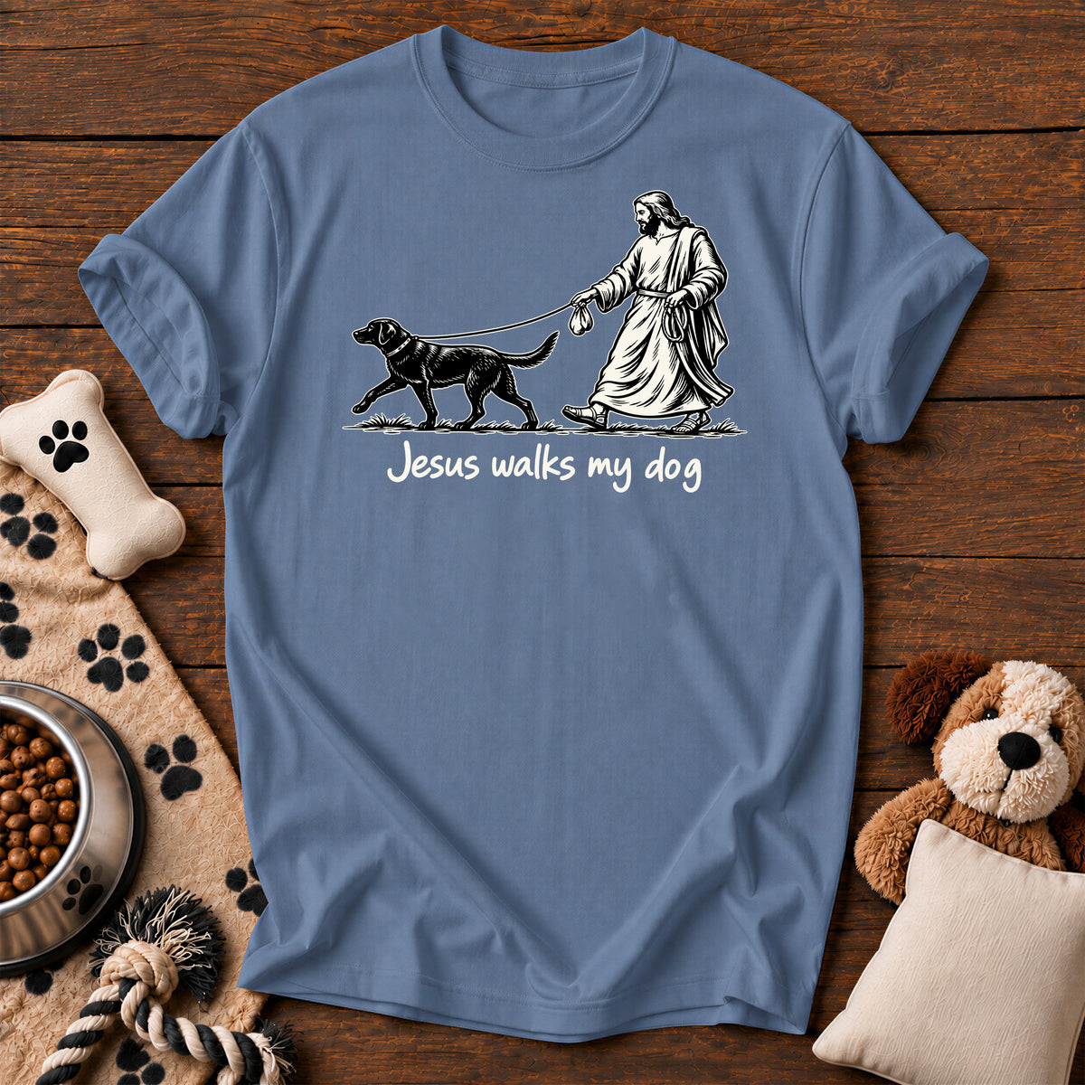 Jesus Walks My Dog Tee — funny Christian dog t-shirt in Blue Jean, Comfort Colors 1717 flat lay