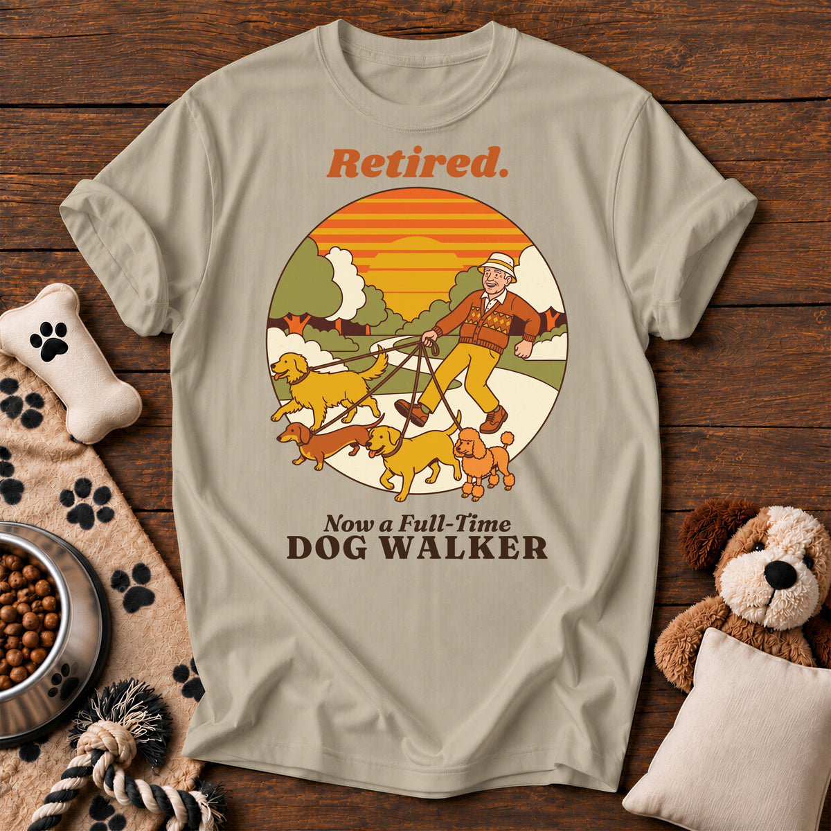 Retired Dog Walker Tee — funny dog t-shirt in Sandstone, Comfort Colors 1717 flat lay